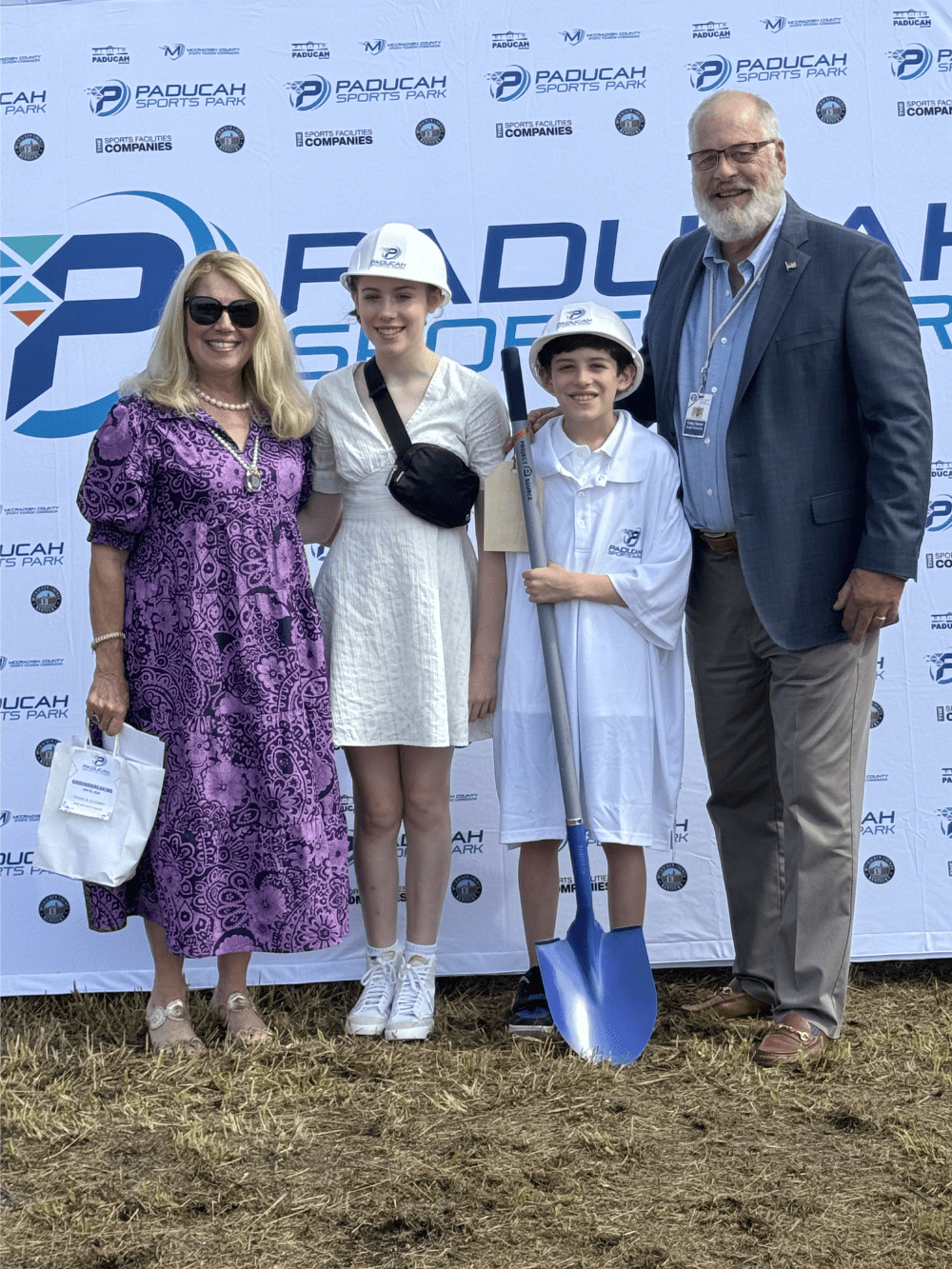 McCracken County Judge Executive Craig Clymer with wife, Phyllis, and grandchildren at ribbon cutting for Paducah-McCracken County Sports Park in Paducah